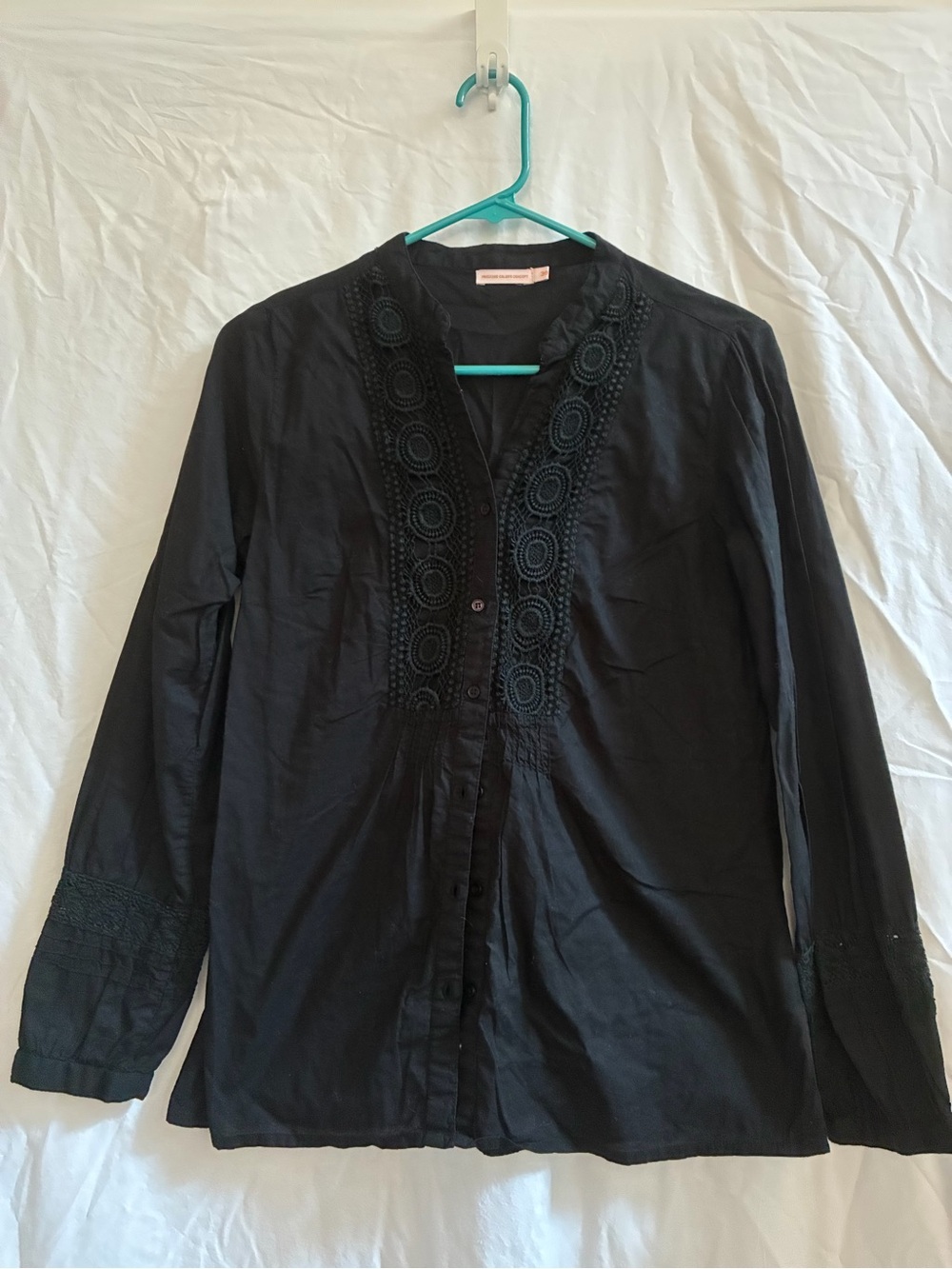 Womenโs black button down with embroidery